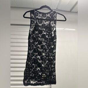 Sleeveless black lace top no size but I’m guessing it’s a medium
